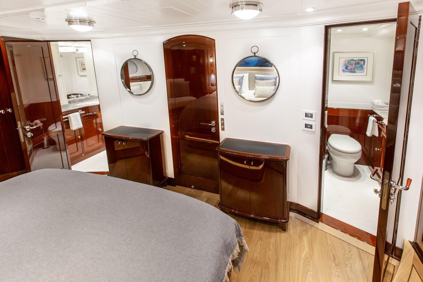 a bathroom with a large bed aboard GRACE III Yacht for Sale