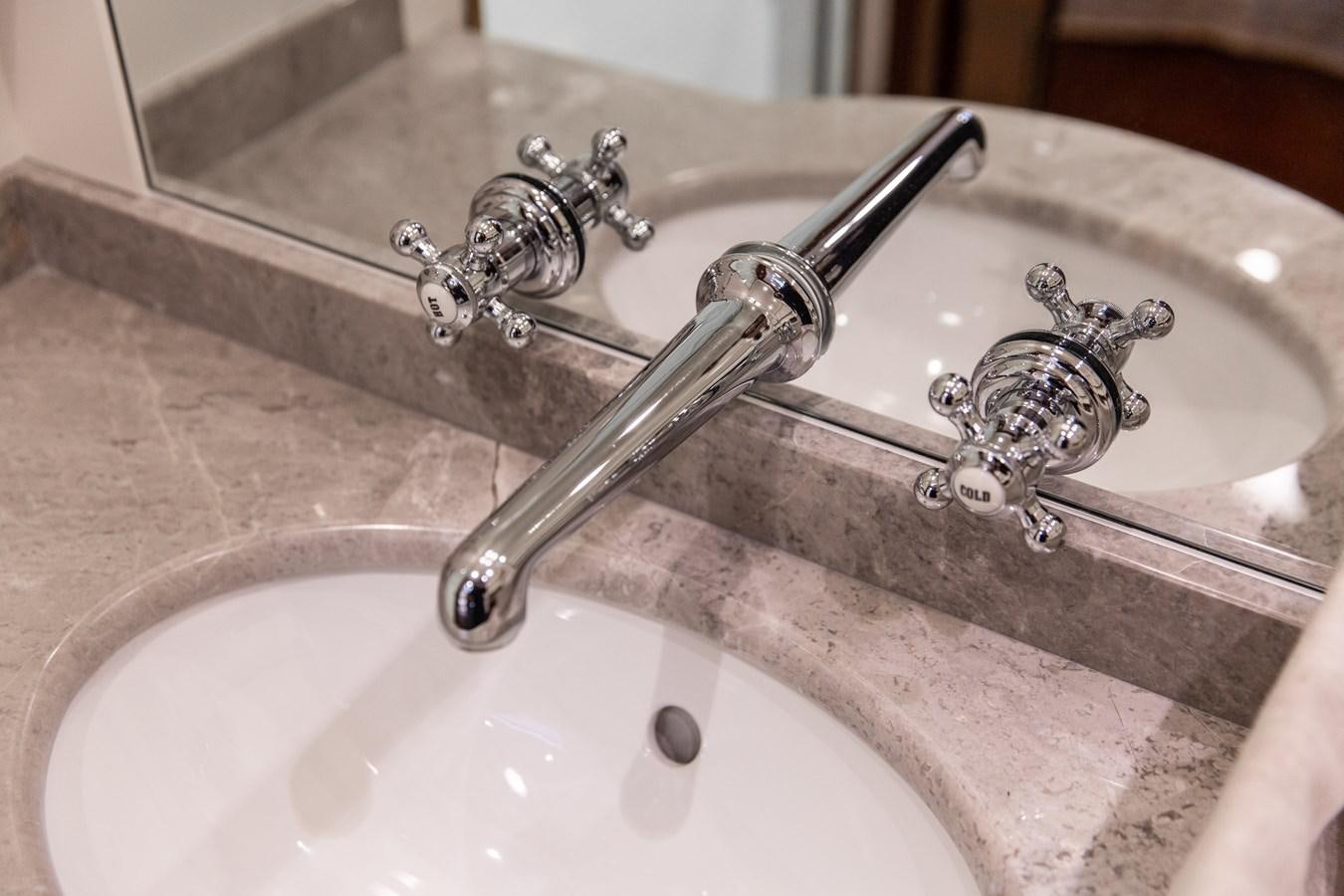 a sink with a faucet aboard GRACE III Yacht for Sale
