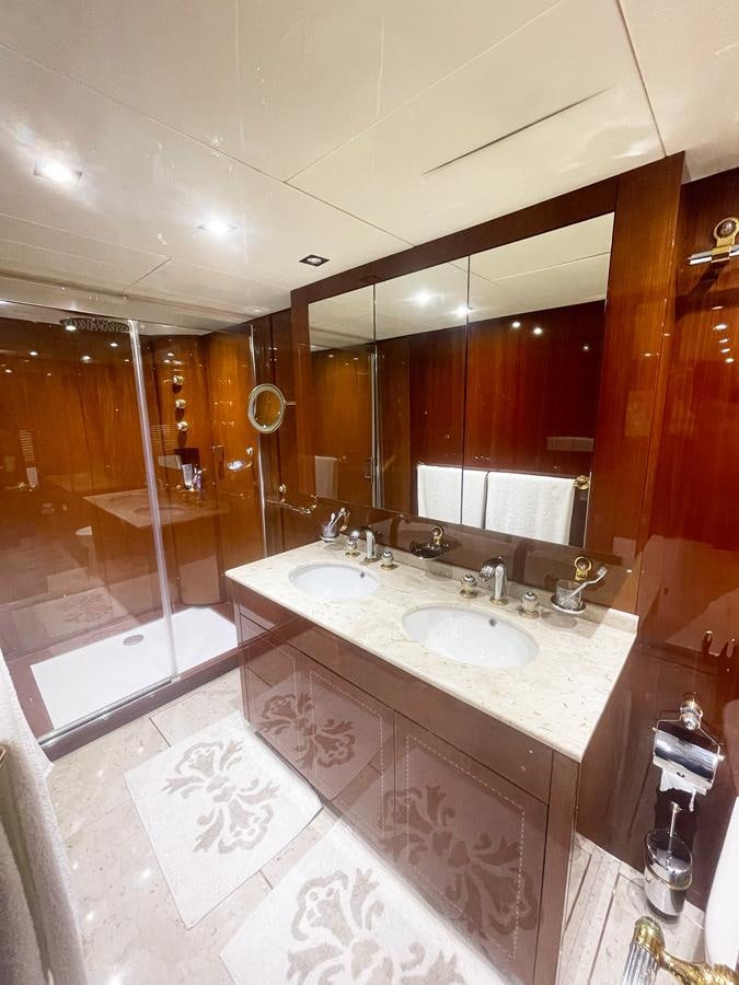 a bathroom with two sinks aboard NAISCA IV Yacht for Sale