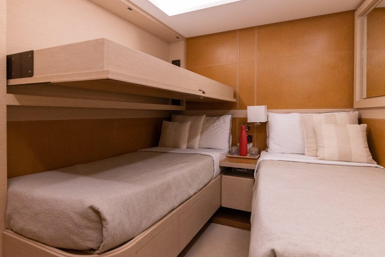 a room with two beds aboard LIBERTY CALL Yacht for Sale