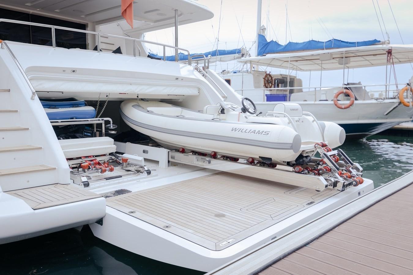 a group of boats on a dock aboard LIBERTY CALL Yacht for Sale