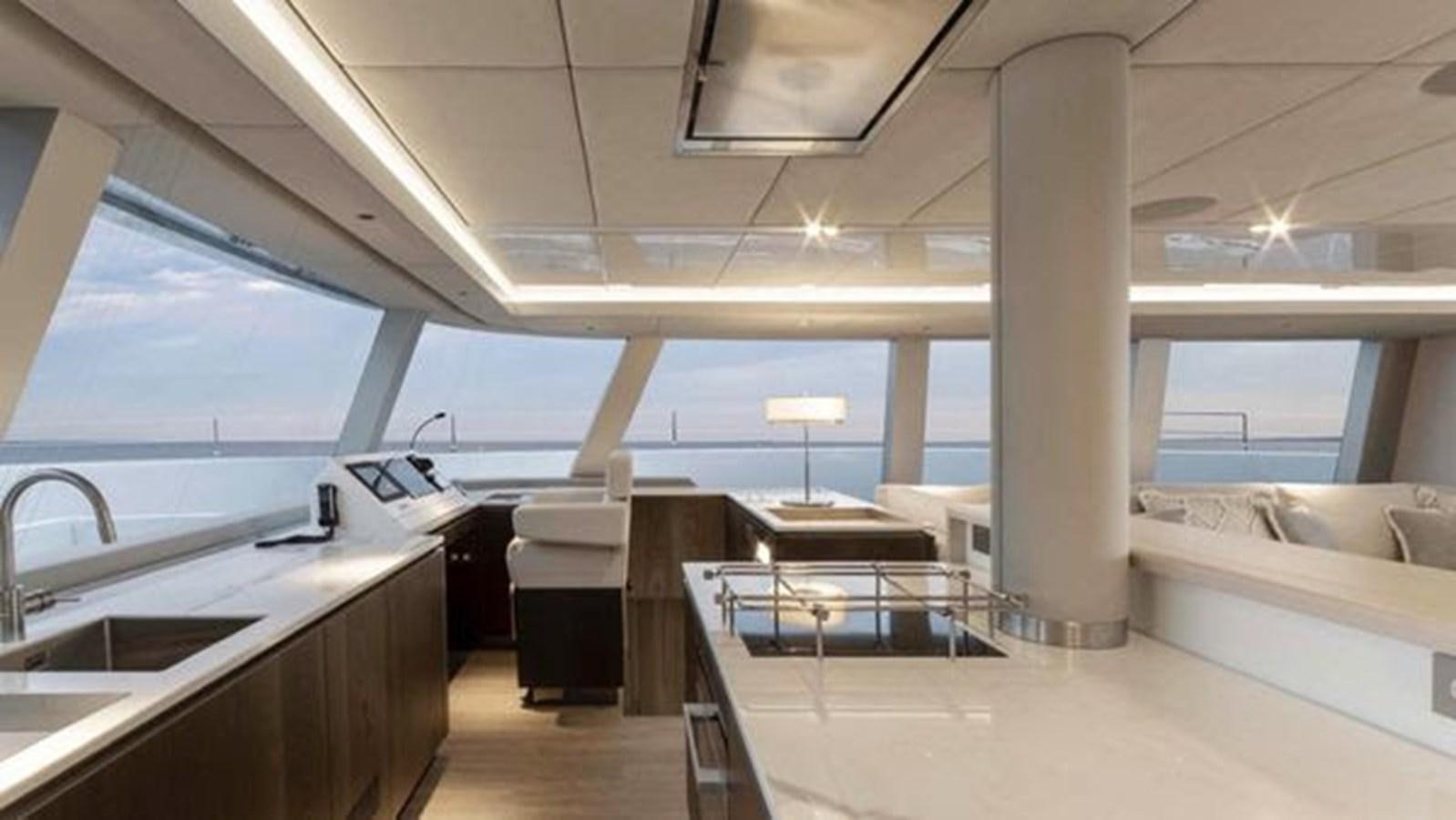 a room with a large window aboard TRUE NORTH Yacht for Sale