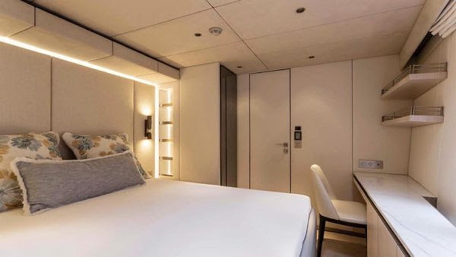 a bed in a room aboard TRUE NORTH Yacht for Sale