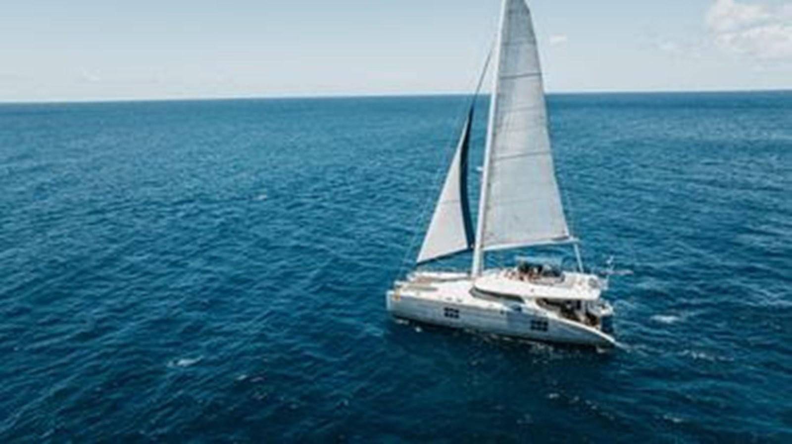 a boat sailing in the sea aboard 2012 SUNREEF C Yacht for Sale