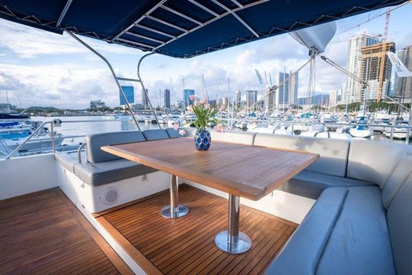 a table on a deck aboard 2012 SUNREEF C Yacht for Sale