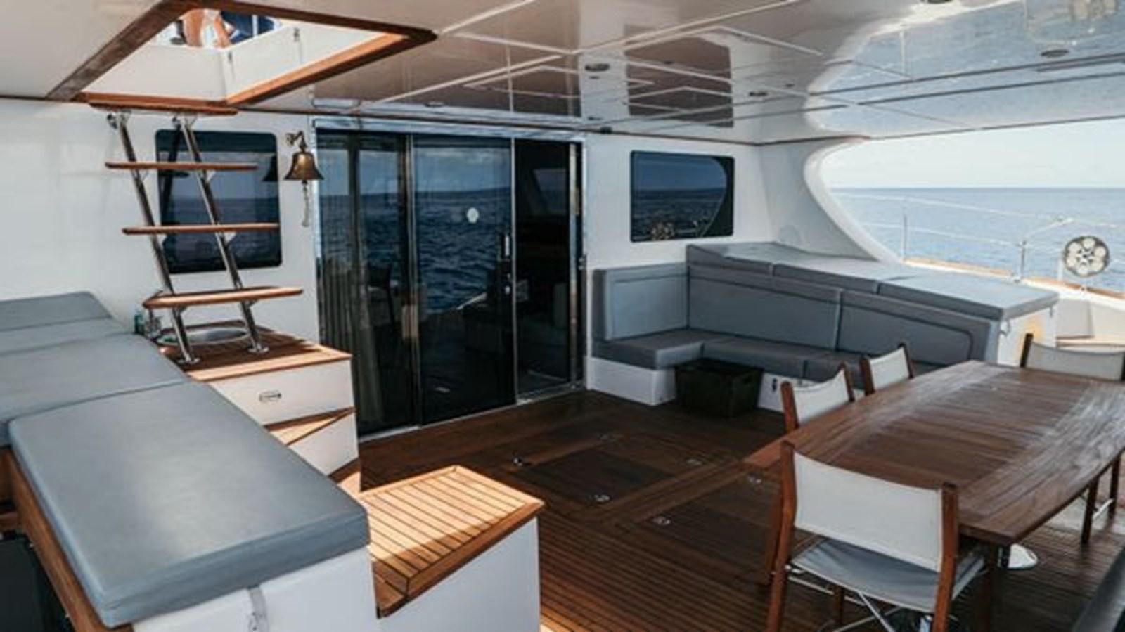a room with a bed and a desk aboard 2012 SUNREEF C Yacht for Sale