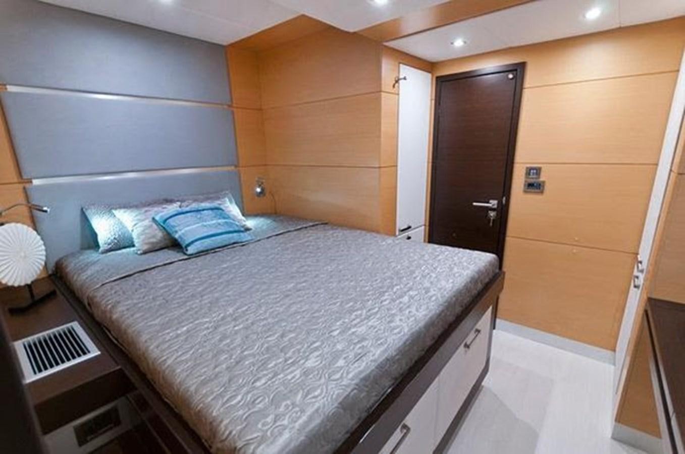 a bed in a room aboard 2012 SUNREEF C Yacht for Sale