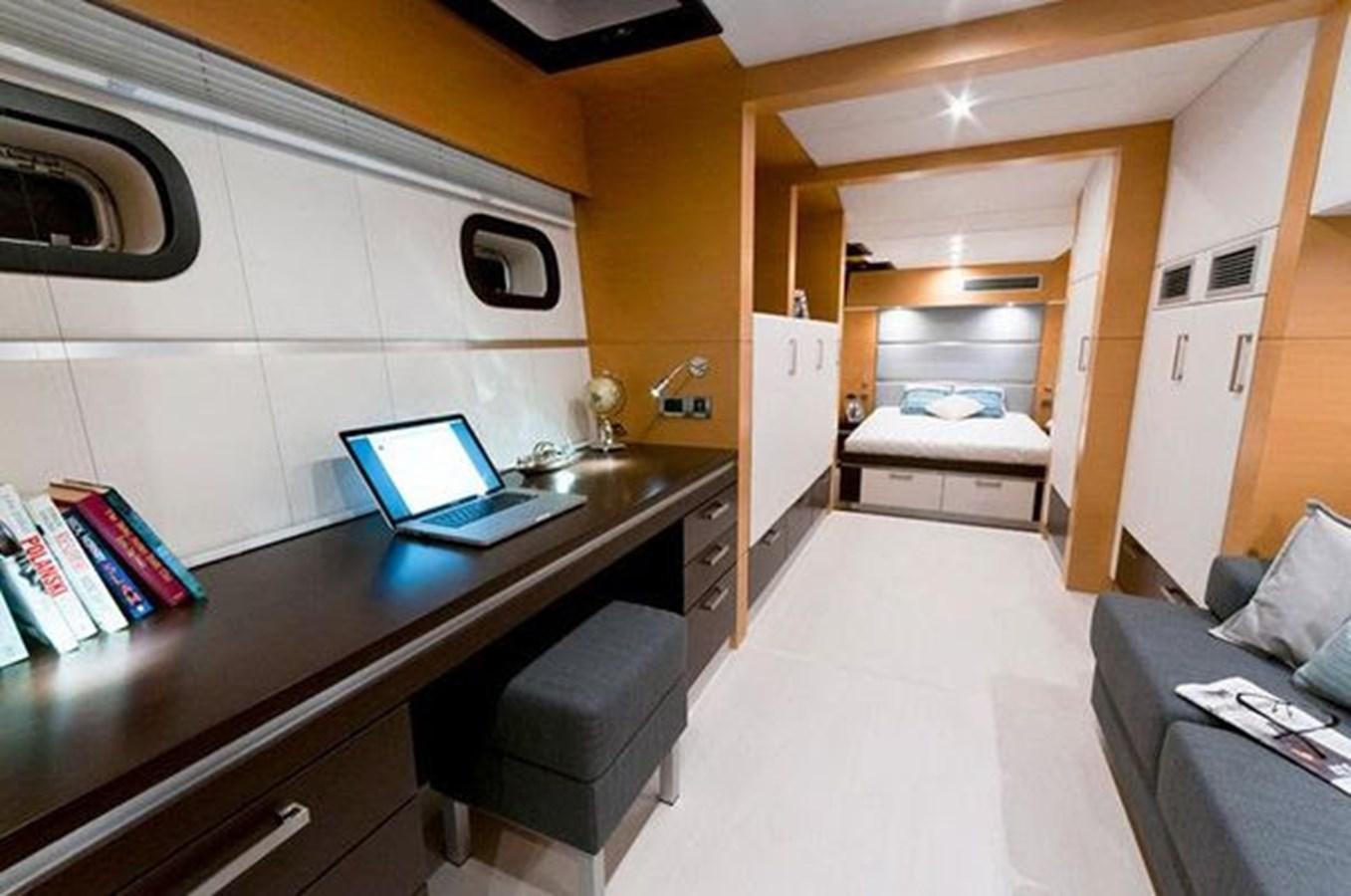 a kitchen with a laptop on the counter aboard 2012 SUNREEF C Yacht for Sale