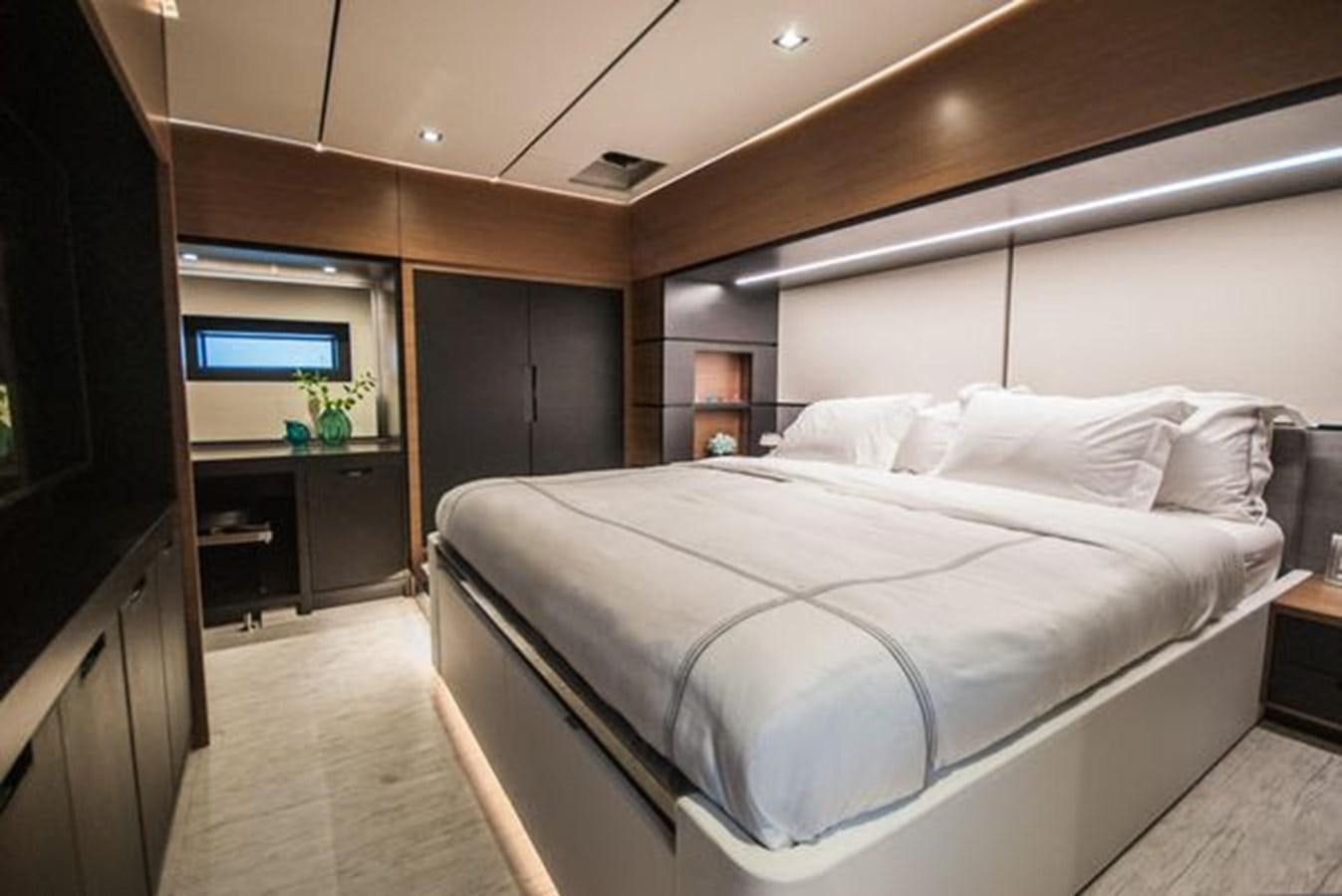 a bed in a room aboard 2024 MCP GLOBAL EXP 68 Yacht for Sale