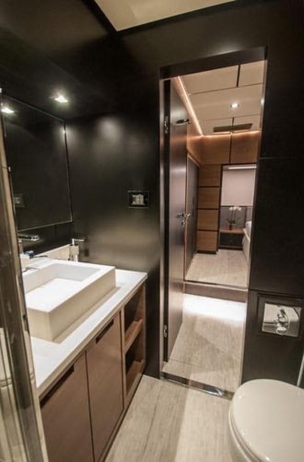 a bathroom with a sink and a toilet aboard 2024 MCP GLOBAL EXP 68 Yacht for Sale
