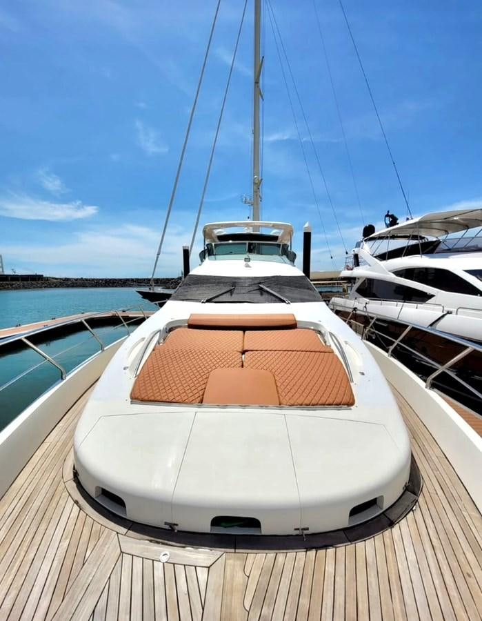 a boat on a deck aboard M&M Yacht for Sale