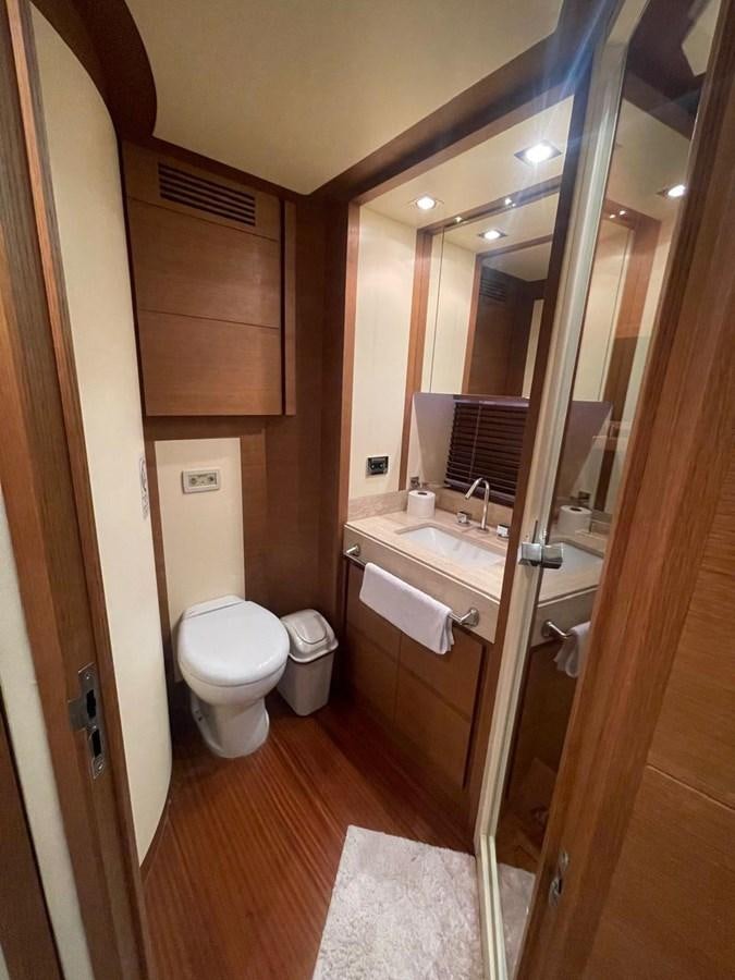 a bathroom with a toilet and sink aboard M&M Yacht for Sale
