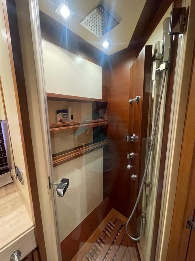 a closet with a mirror aboard M&M Yacht for Sale