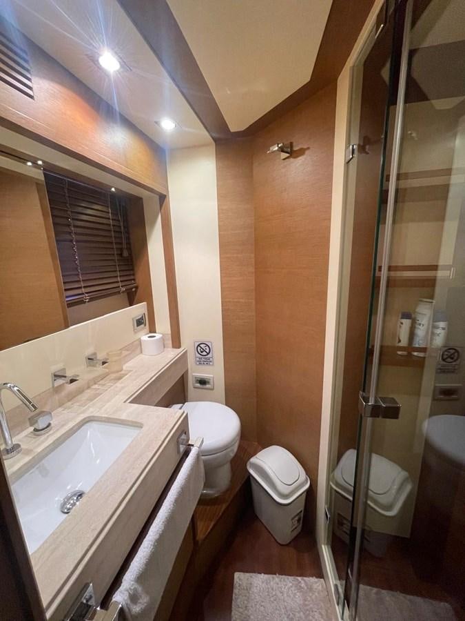 a bathroom with a sink toilet and a shower aboard M&M Yacht for Sale