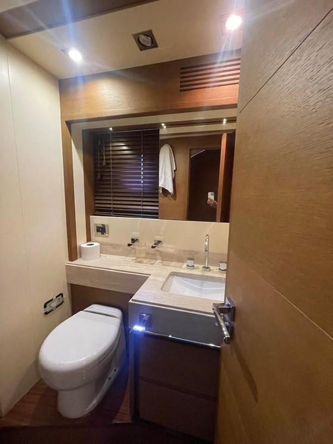 a bathroom with a toilet and sink aboard M&M Yacht for Sale