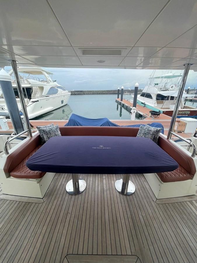 a table on a boat aboard M&M Yacht for Sale