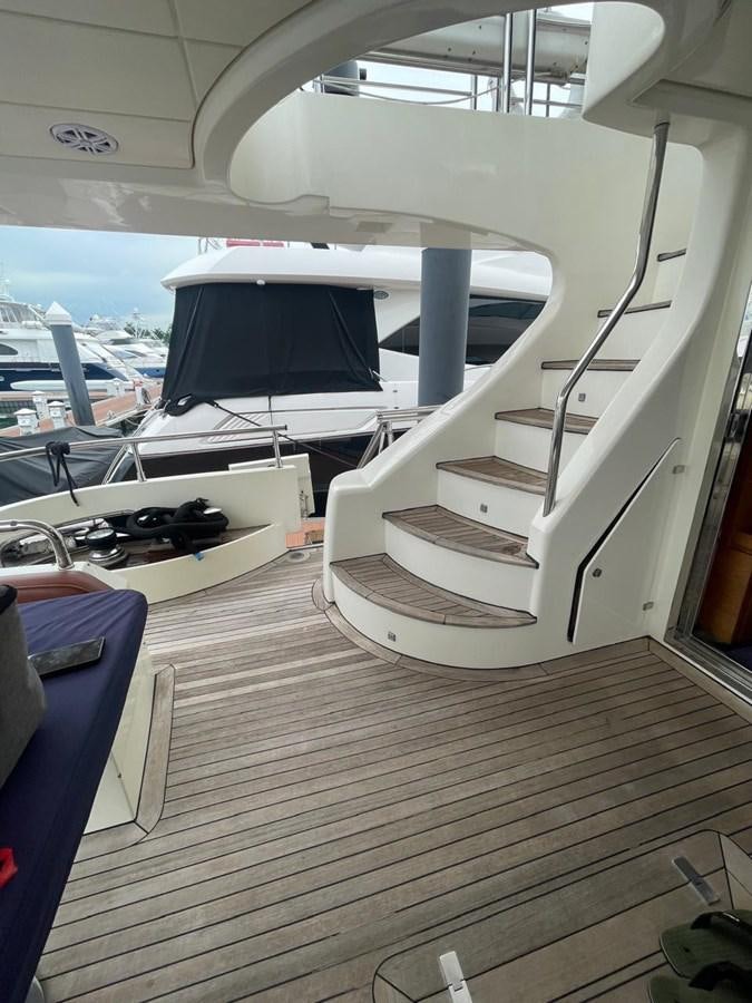 a boat on a deck aboard M&M Yacht for Sale