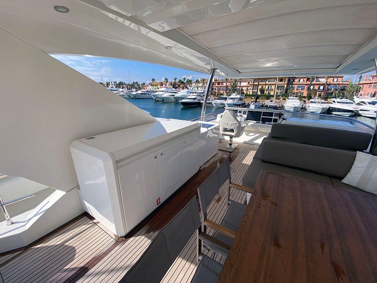 a deck with a view of a marina and boats aboard MY PRINCESS OF THE SEAS Yacht for Sale