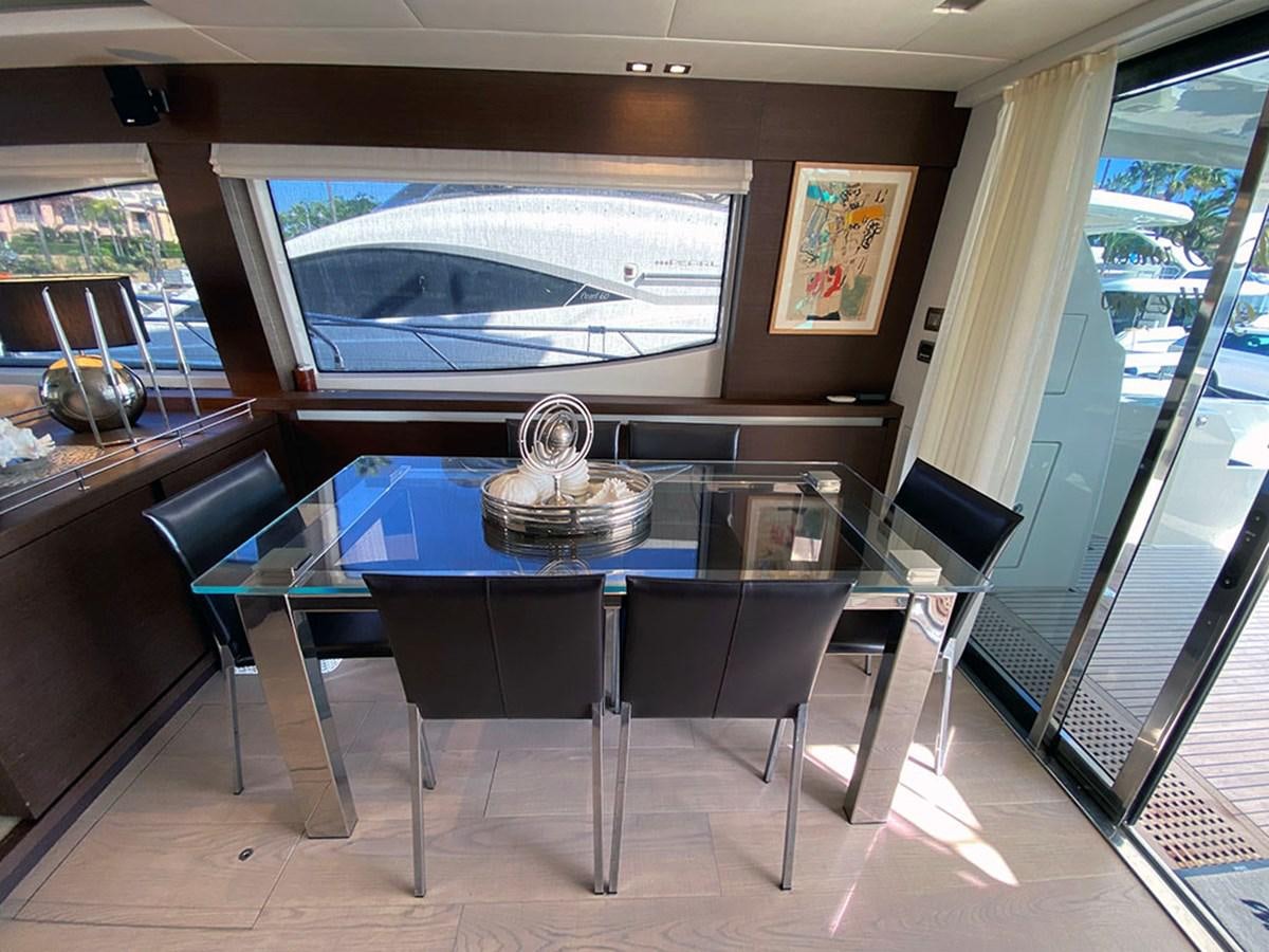 a table with a glass window aboard MY PRINCESS OF THE SEAS Yacht for Sale