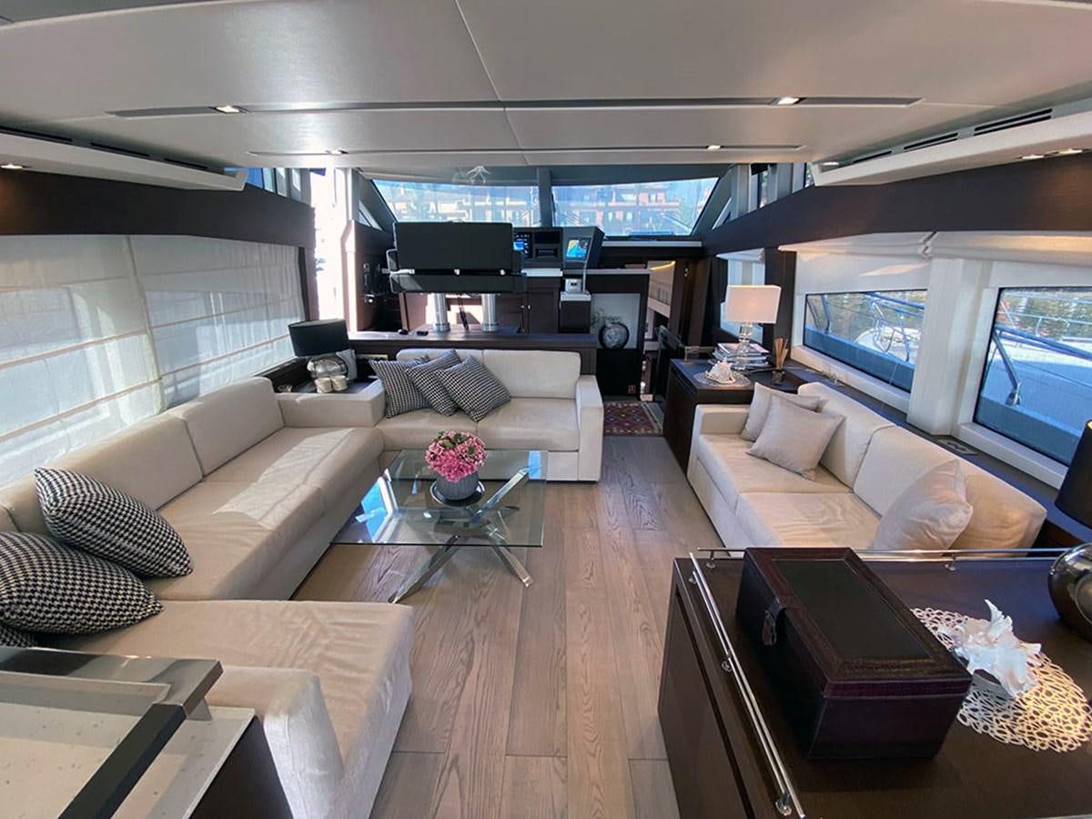 a living room with a large window aboard MY PRINCESS OF THE SEAS Yacht for Sale