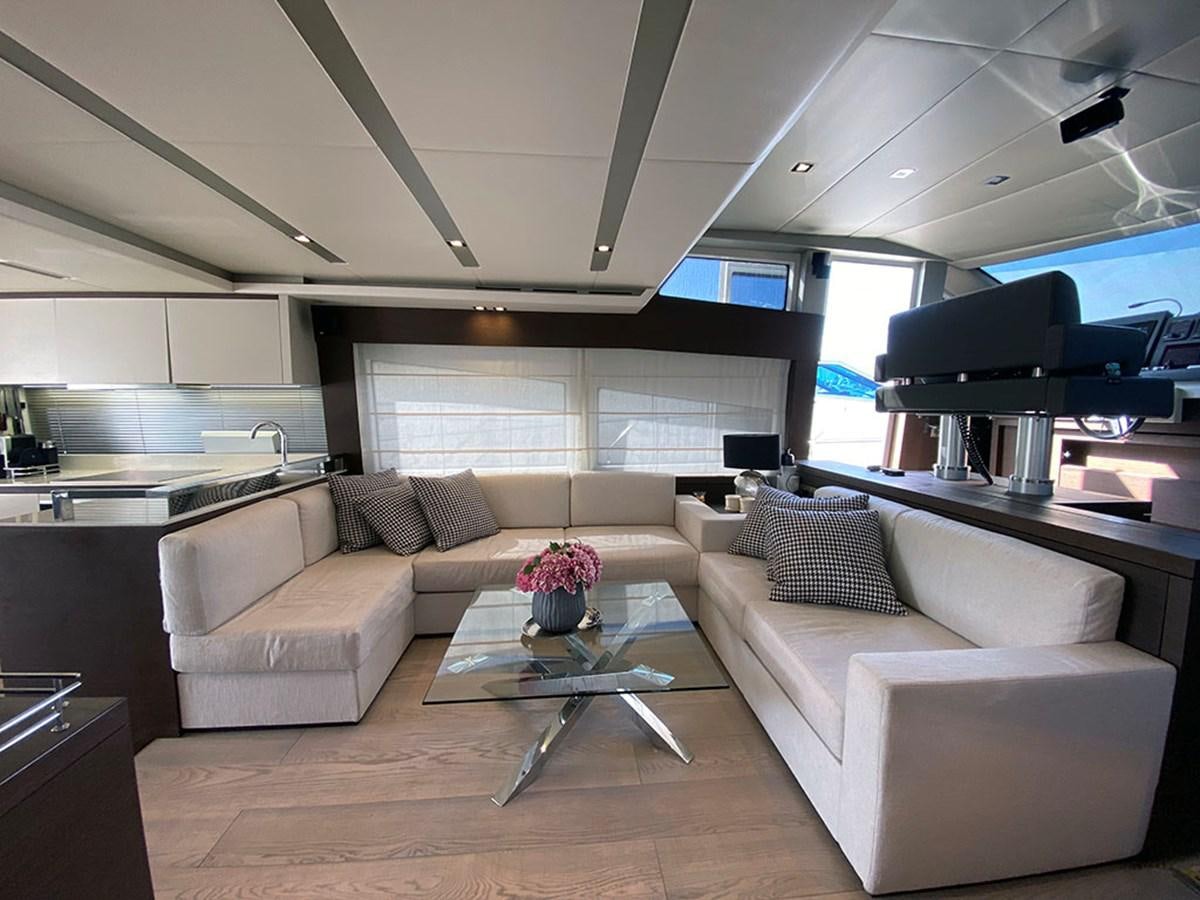 a living room with a couch and a coffee table aboard MY PRINCESS OF THE SEAS Yacht for Sale