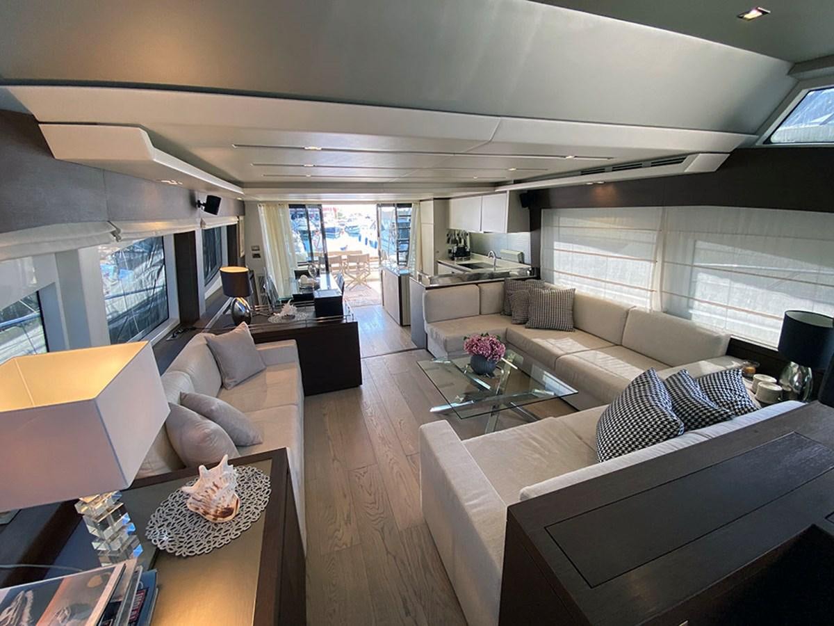 a living room with a large window aboard MY PRINCESS OF THE SEAS Yacht for Sale