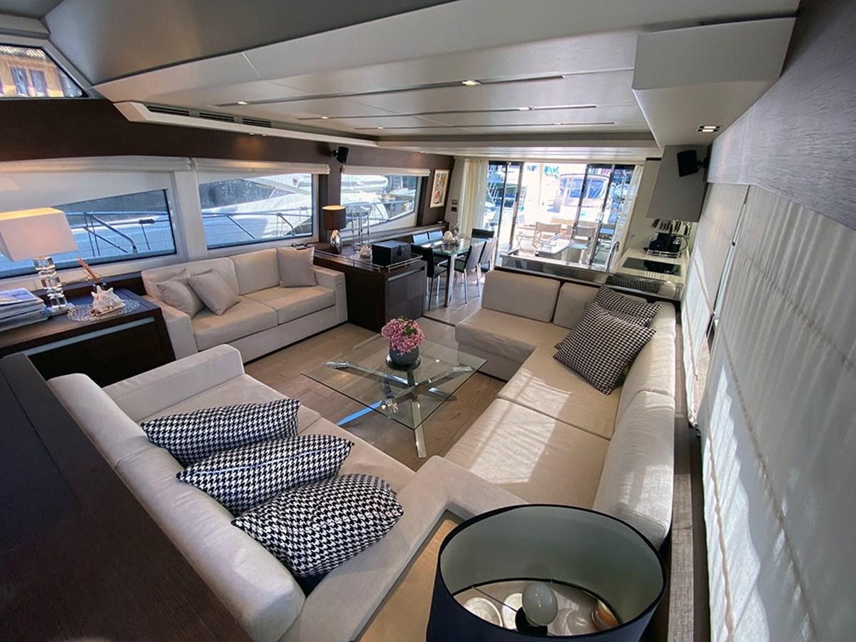 a living room with a large window aboard MY PRINCESS OF THE SEAS Yacht for Sale