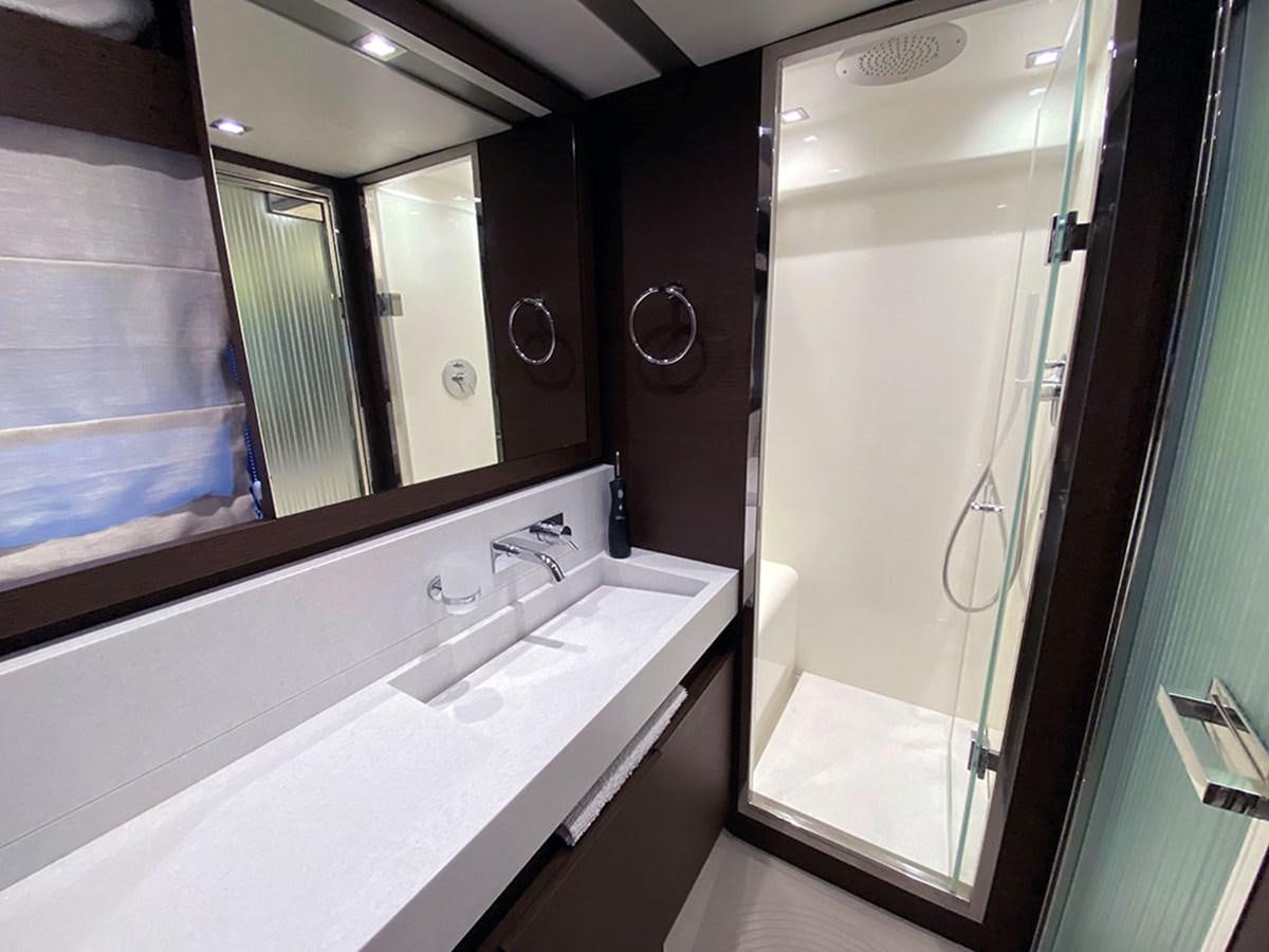 a bathroom with a large mirror aboard MY PRINCESS OF THE SEAS Yacht for Sale