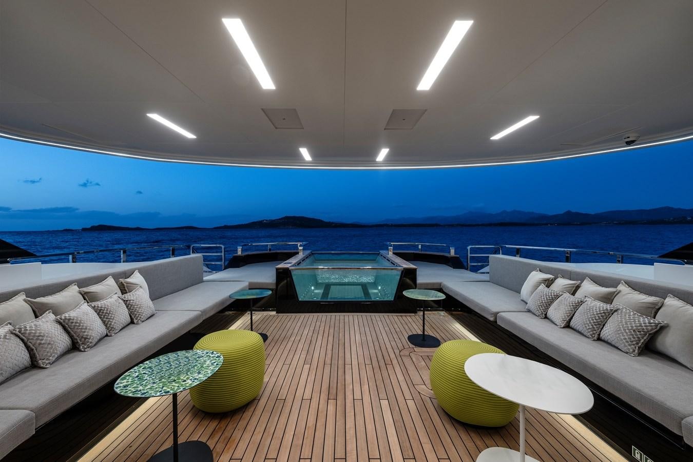 a living room with a couch and a table aboard ISA GT 45 Yacht for Sale