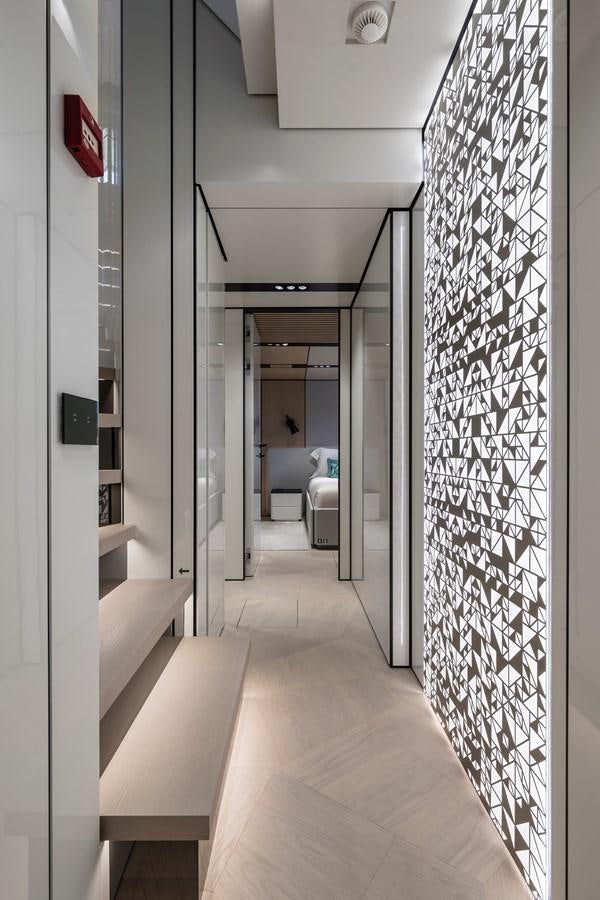 a hallway with a tile wall aboard ISA GT 45 Yacht for Sale