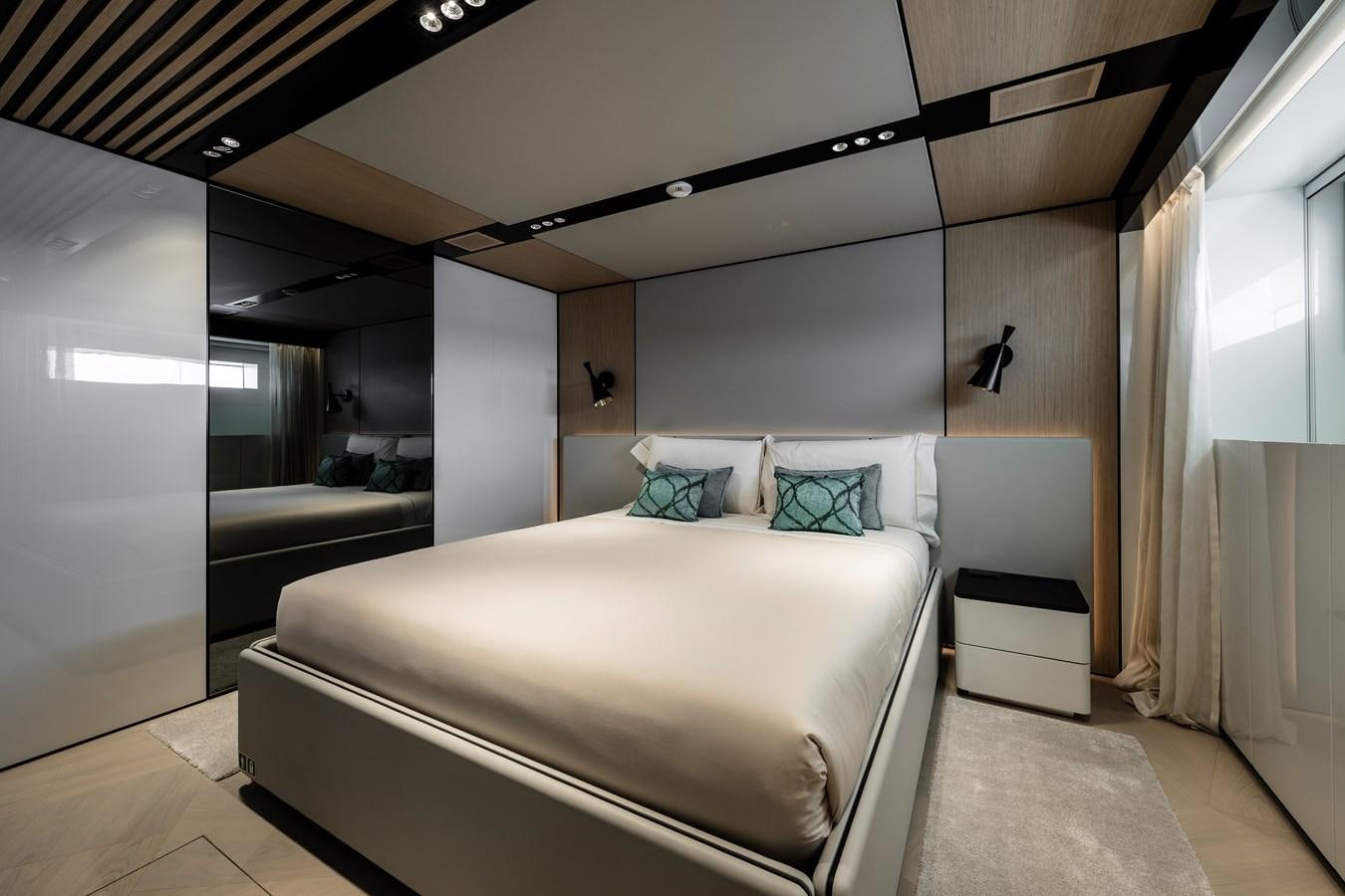 a bed in a room aboard ISA GT 45 Yacht for Sale