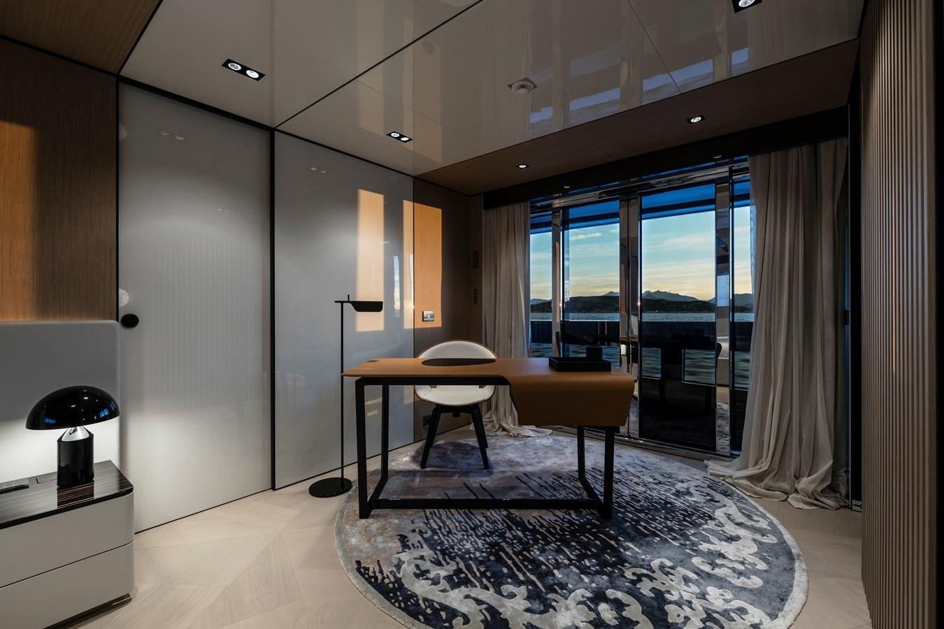 a room with a table and chairs aboard ISA GT 45 Yacht for Sale