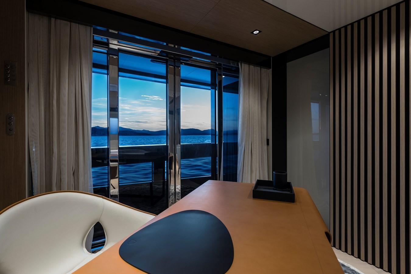 a room with a desk and a window aboard ISA GT 45 Yacht for Sale