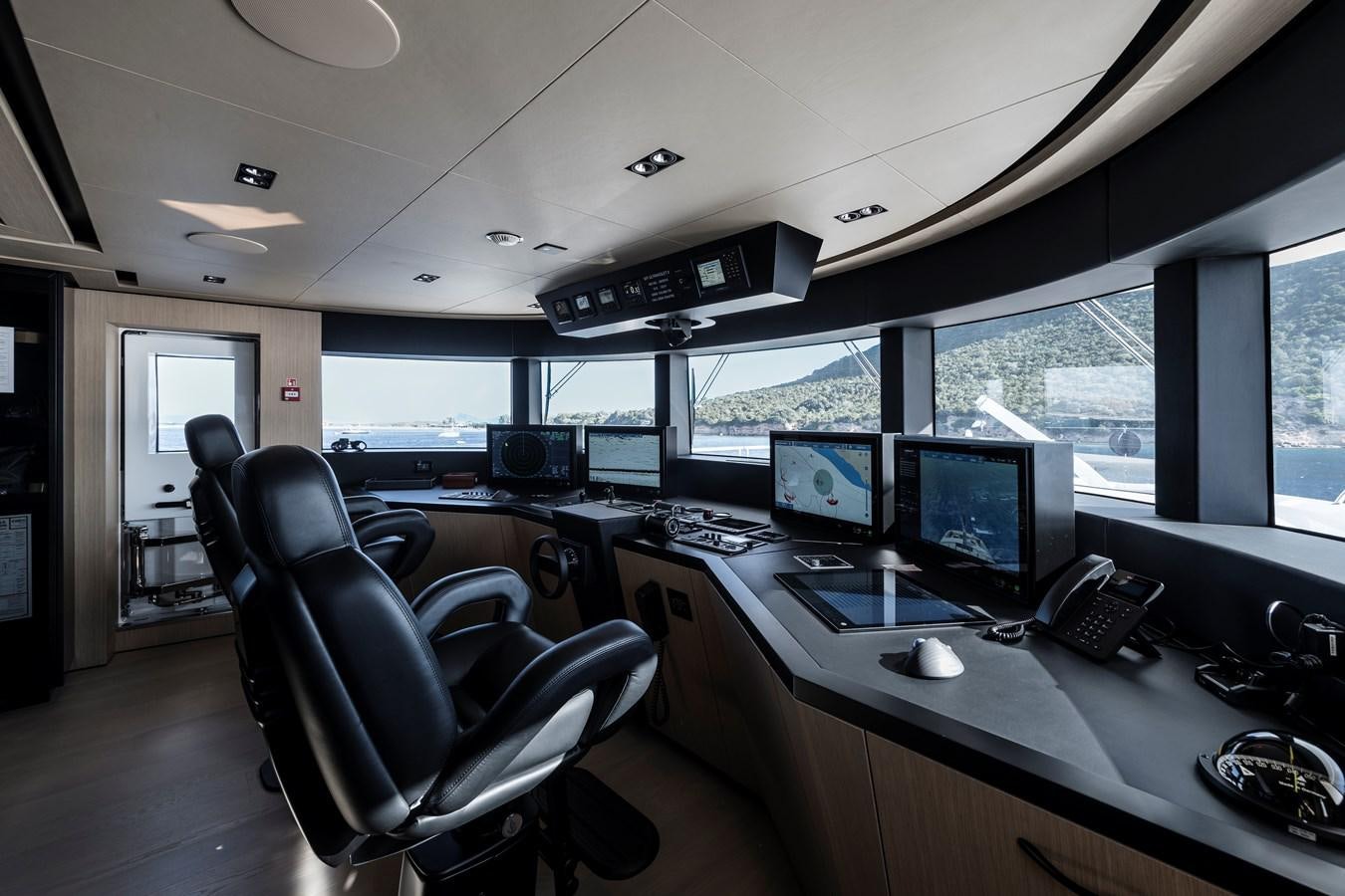 a room with computers and monitors aboard ISA GT 45 Yacht for Sale