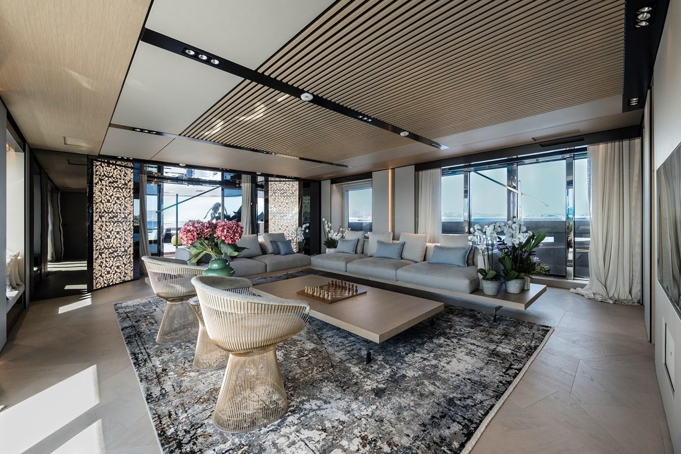 a living room with a large open window aboard ISA GT 45 Yacht for Sale