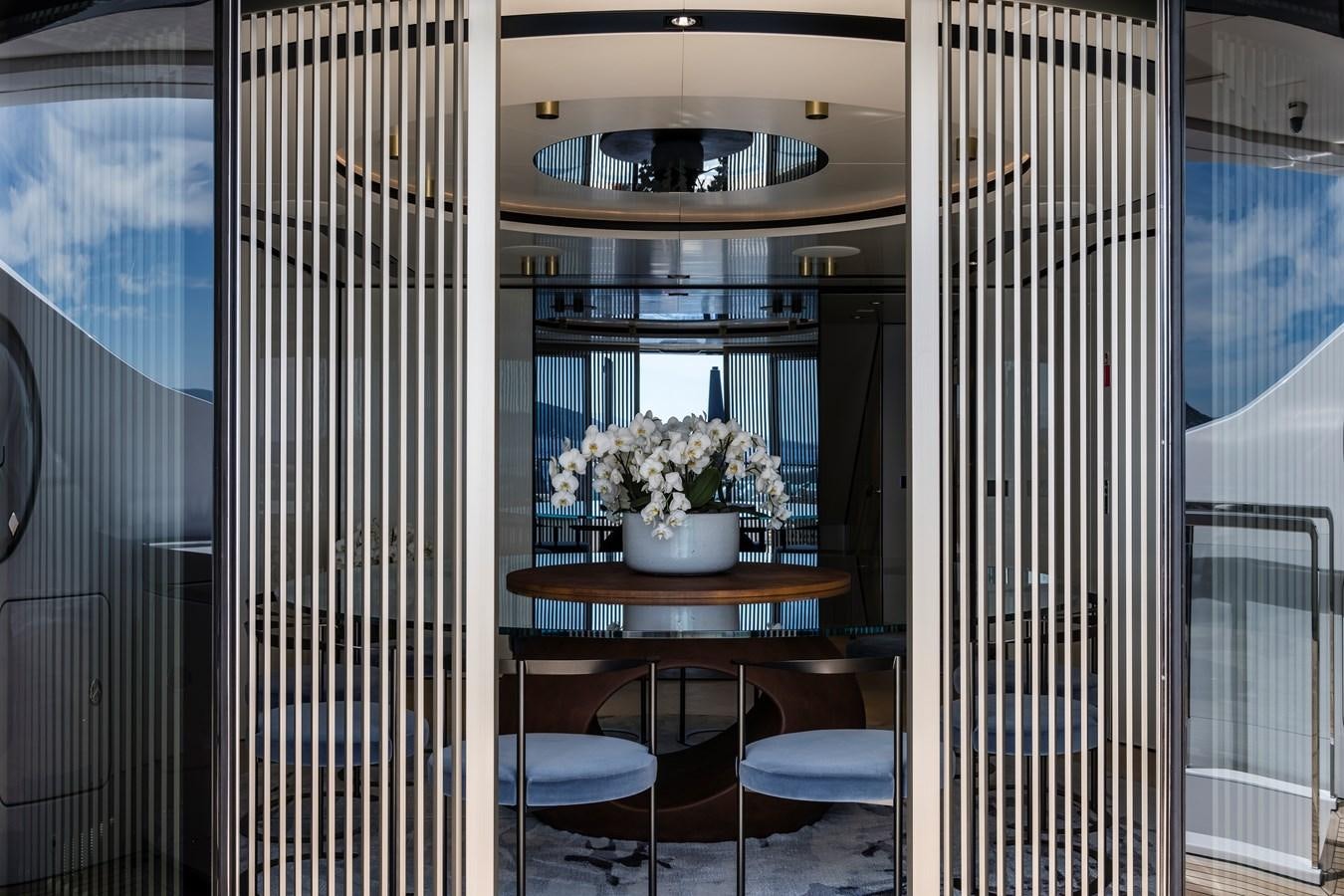 a room with a table and chairs aboard ISA GT 45 Yacht for Sale