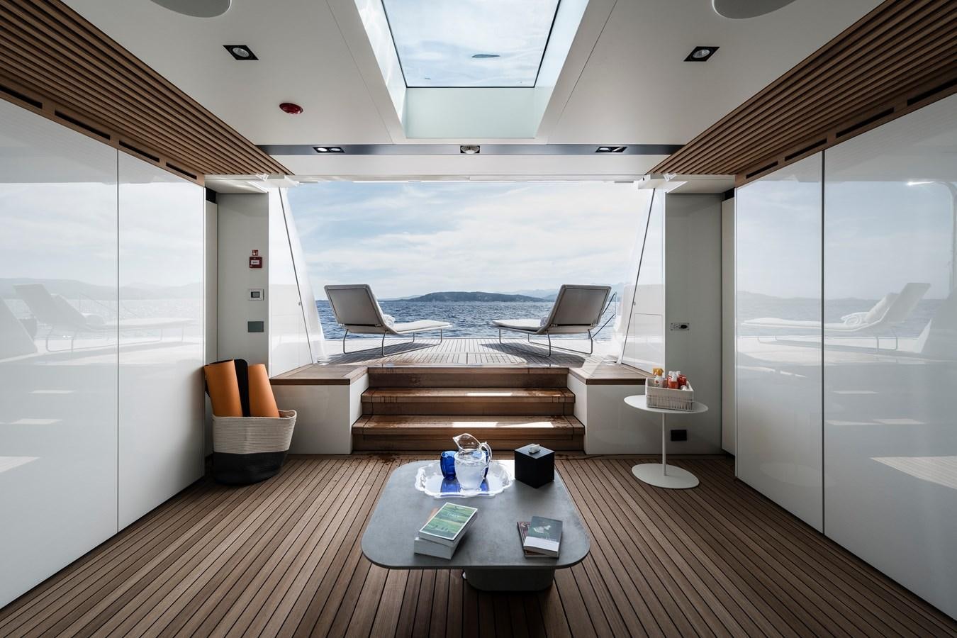 a room with a table and chairs aboard ISA GT 45 Yacht for Sale