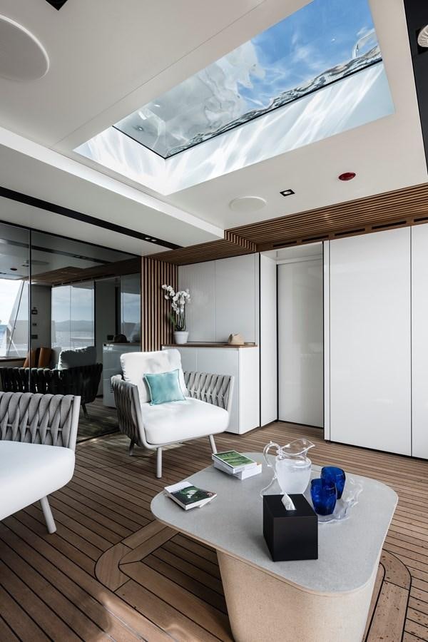 a room with a table and chairs aboard ISA GT 45 Yacht for Sale