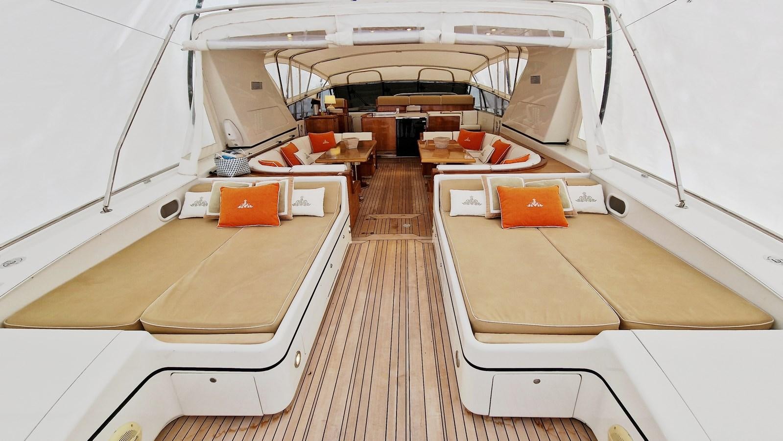 a room with a wood floor and white walls aboard BLUE TRINITY Yacht for Sale