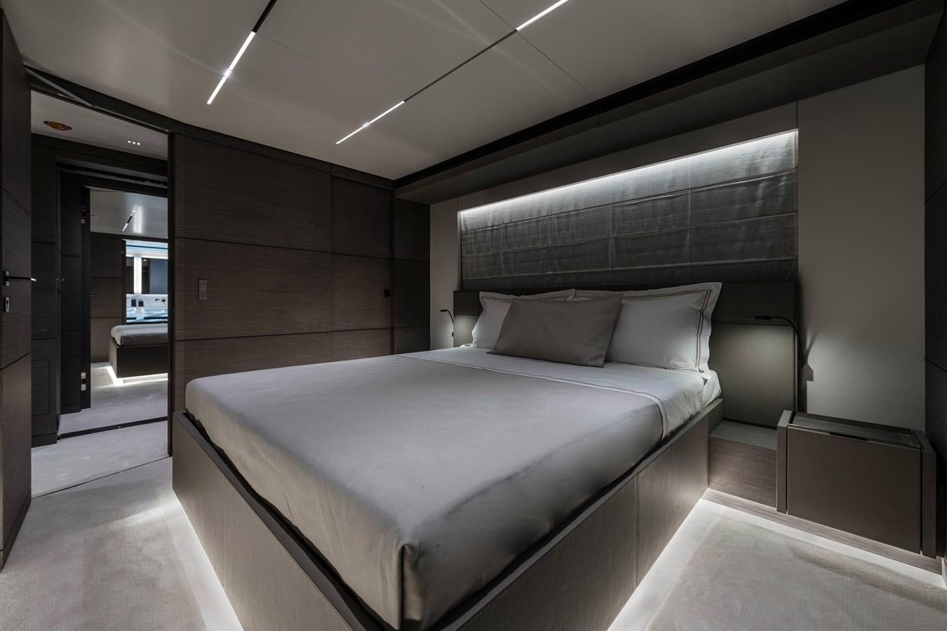 a bed in a room aboard REGINA Yacht for Sale