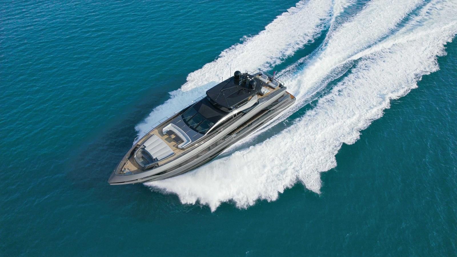 a helicopter flying over a boat aboard CRAZY TOO Yacht for Sale