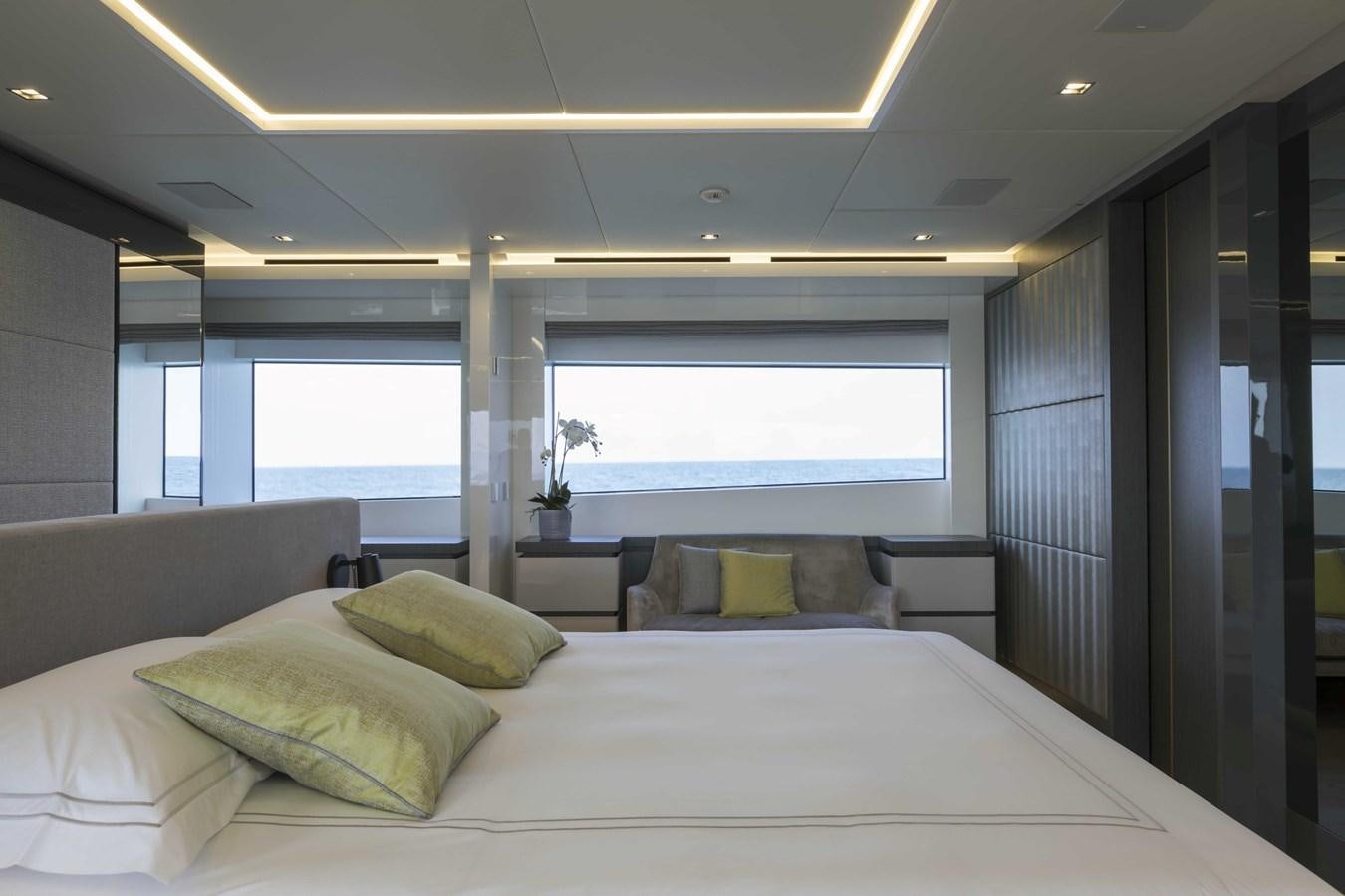 a bed with pillows aboard CRAZY TOO Yacht for Sale