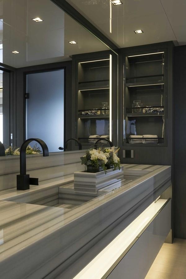 a large kitchen with a large counter aboard CRAZY TOO Yacht for Sale