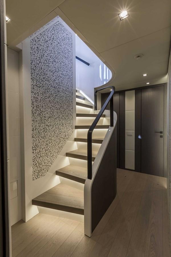 a staircase in a house aboard CRAZY TOO Yacht for Sale