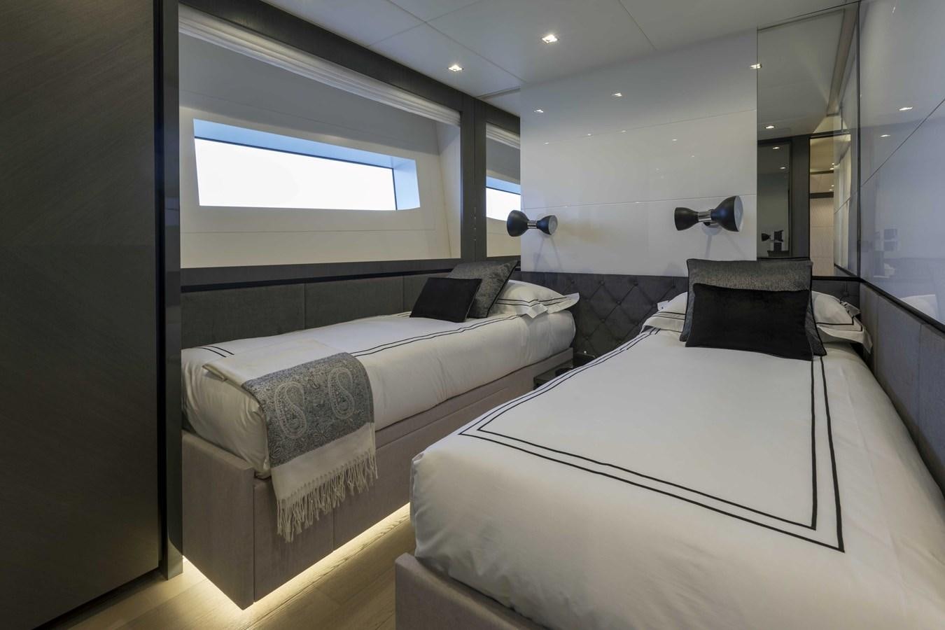 a room with two beds aboard CRAZY TOO Yacht for Sale