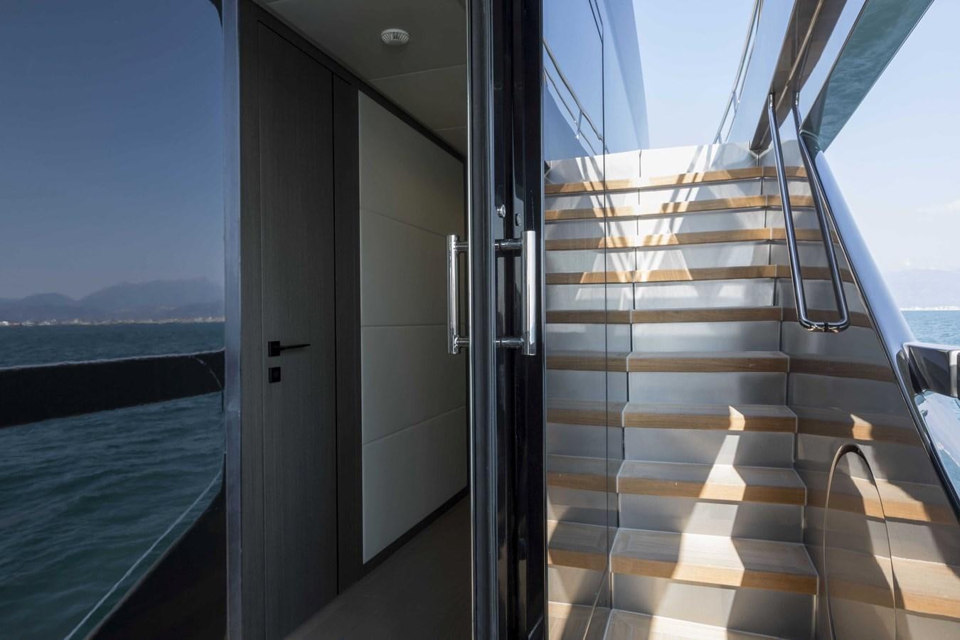 a large window with a view of the ocean aboard CRAZY TOO Yacht for Sale