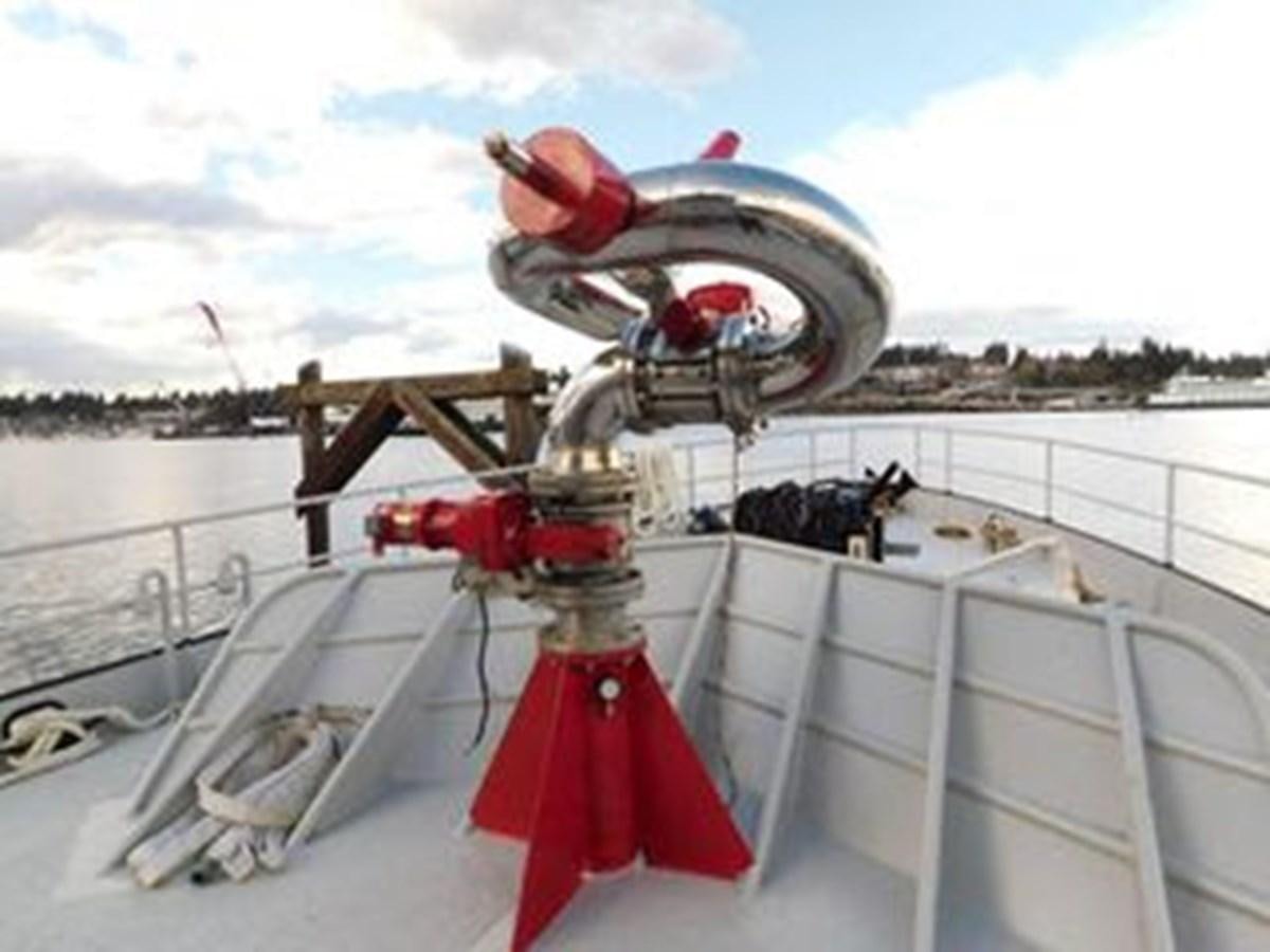 a large telescope on a boat aboard 1989 COMMERCIAL FIREBOAT Yacht for Sale