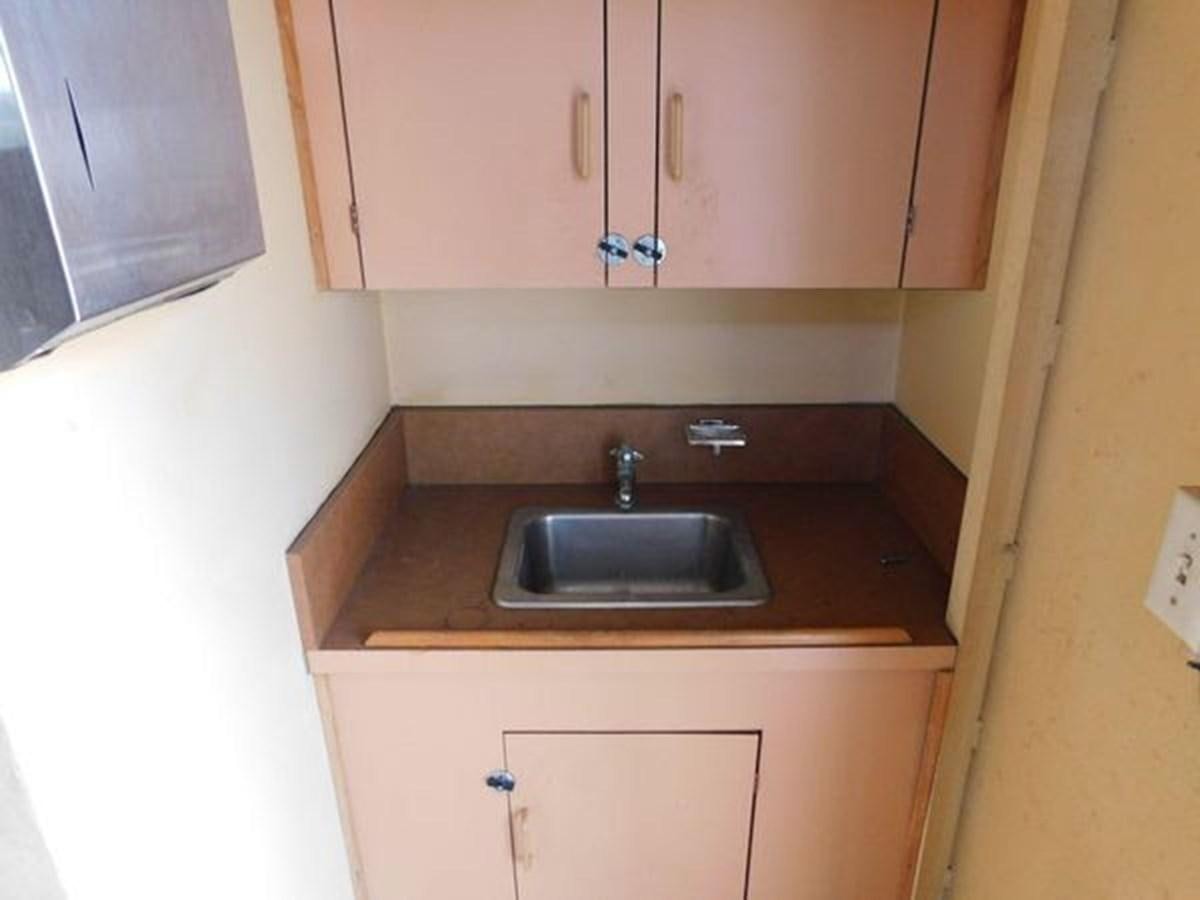 a sink in a kitchen aboard 1989 COMMERCIAL FIREBOAT Yacht for Sale