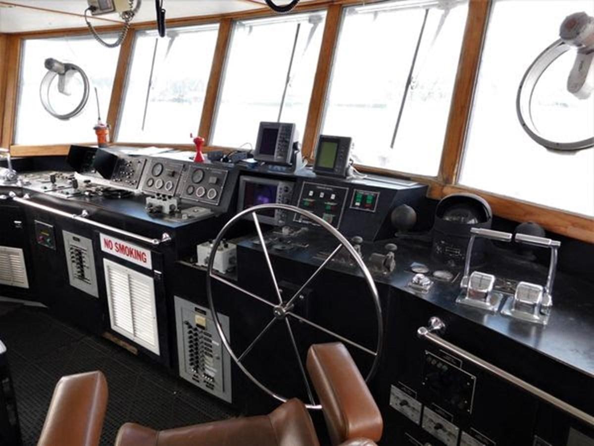 a room with a large machine aboard 1989 COMMERCIAL FIREBOAT Yacht for Sale
