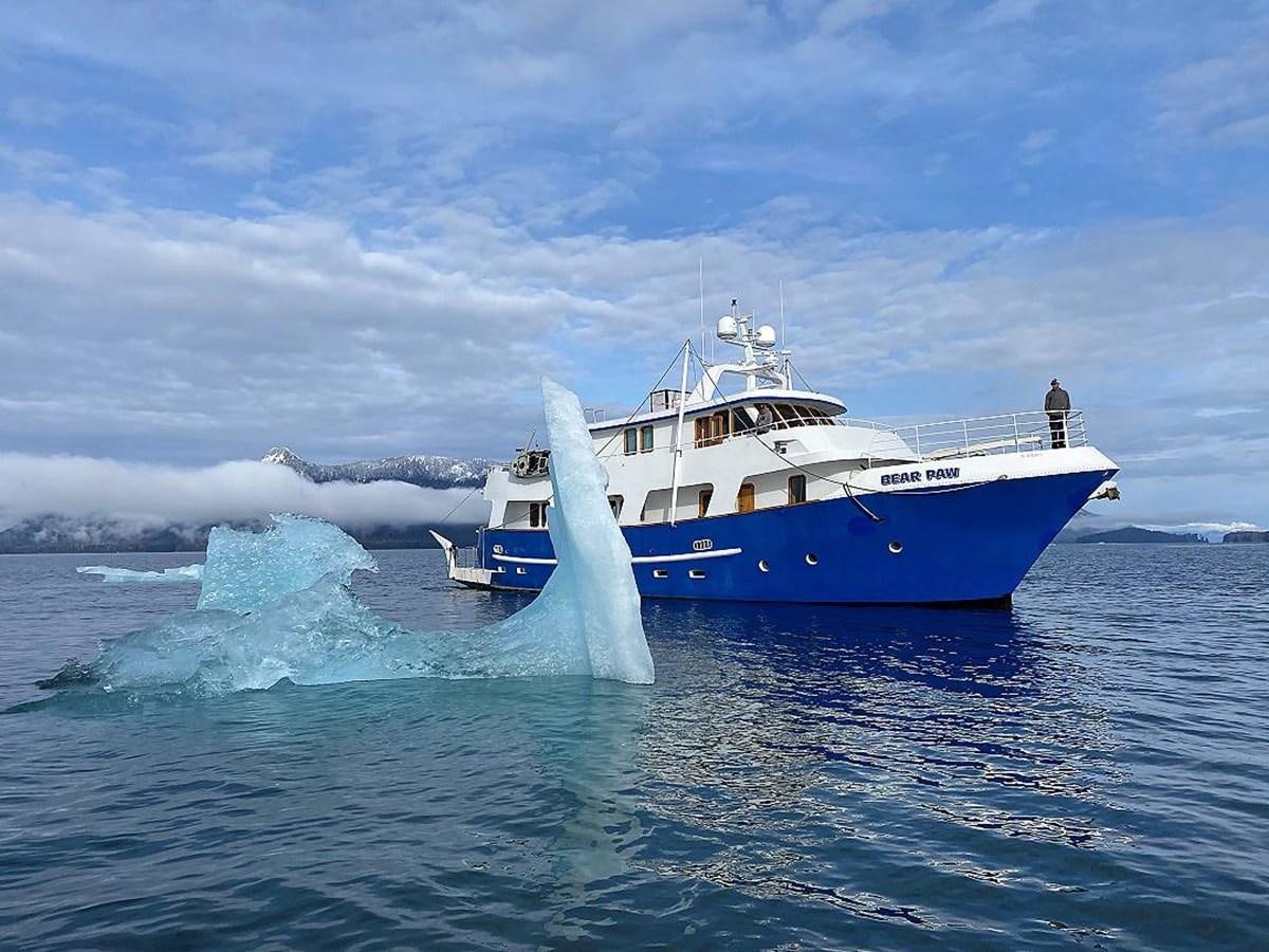 a boat in the water aboard BEAR PAW Yacht for Sale